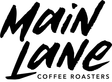 Black and white graphic of a dog sitting and looking upwards.